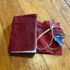 Red leather journal with tie